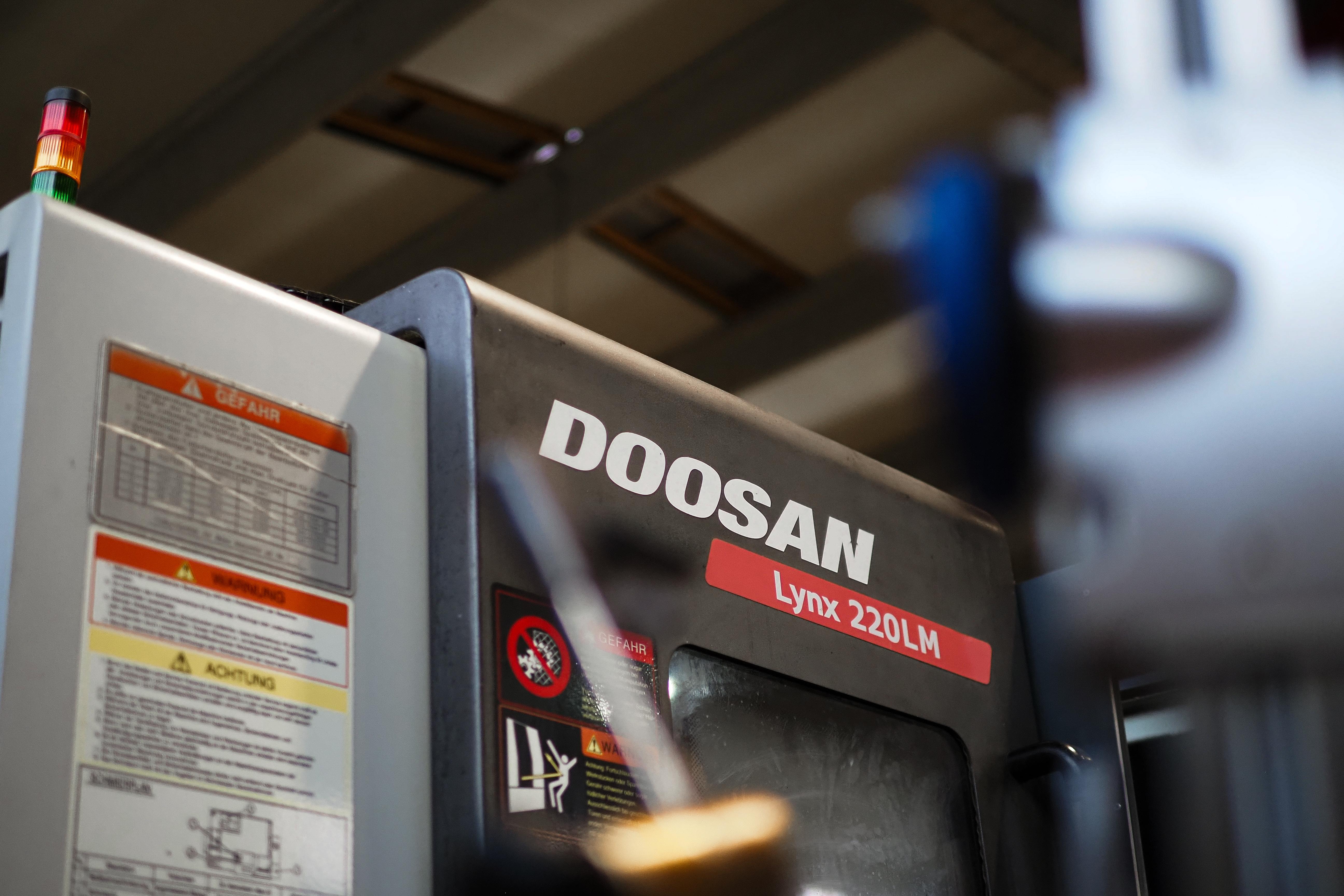 Doosan Lynx CNC lathe nameplate